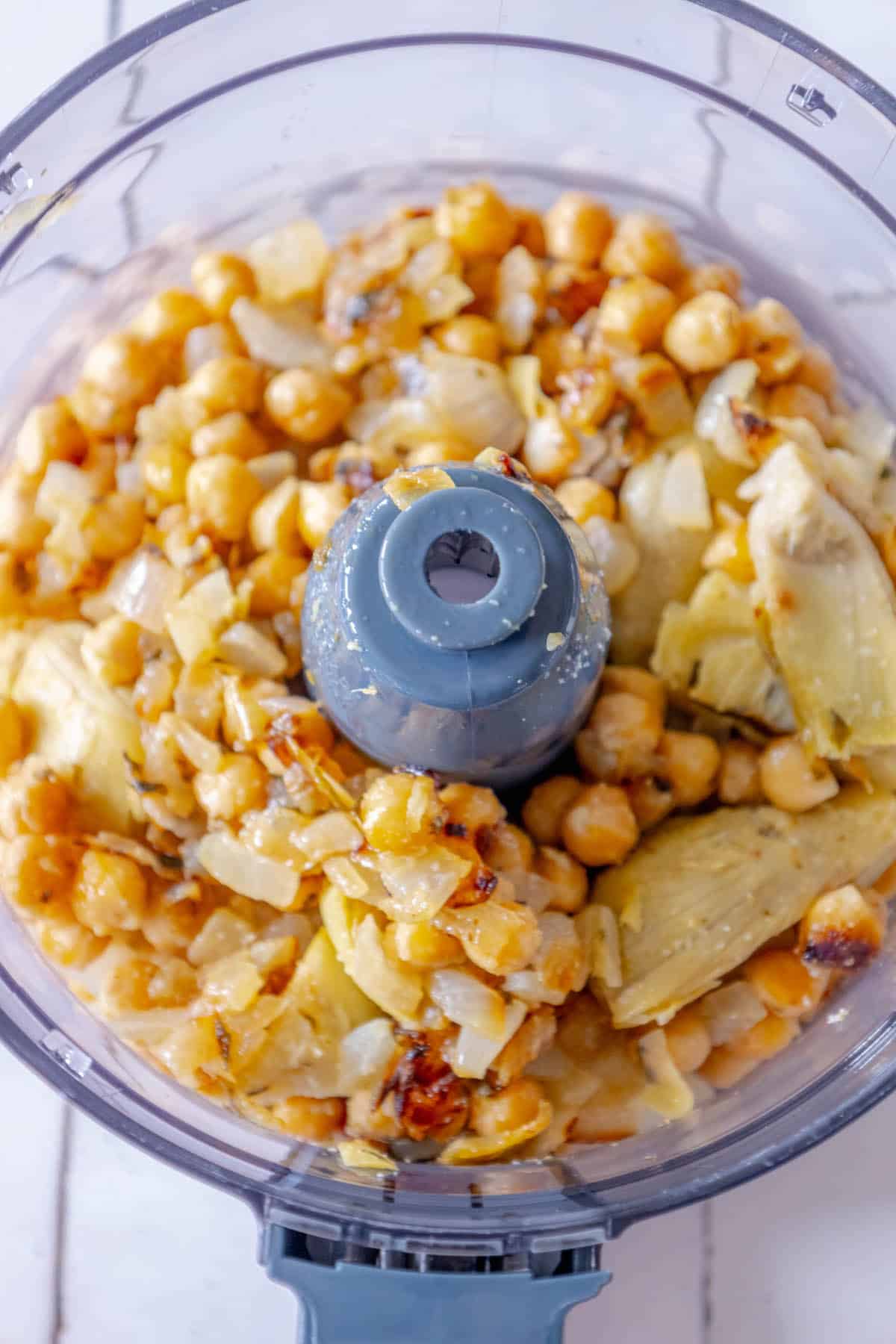 Roasted chickpeas in a food processor.